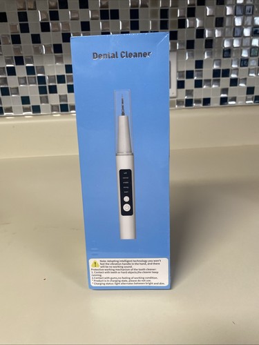 Ultrasonic tooth cleaner - ultrasonic,